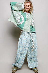 POL Peace Patch Floral Oversized Knit Top